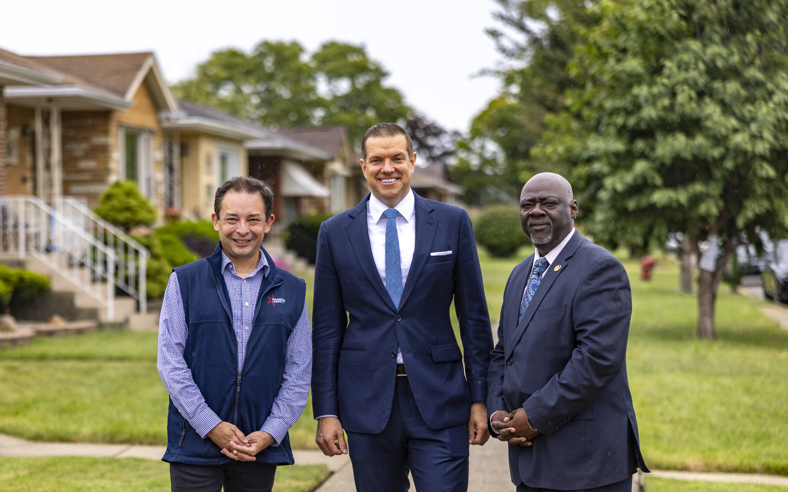 Chris Getty with Alderman Ray Lopez and Alderman Derrick Curtis on a Chicago residential block